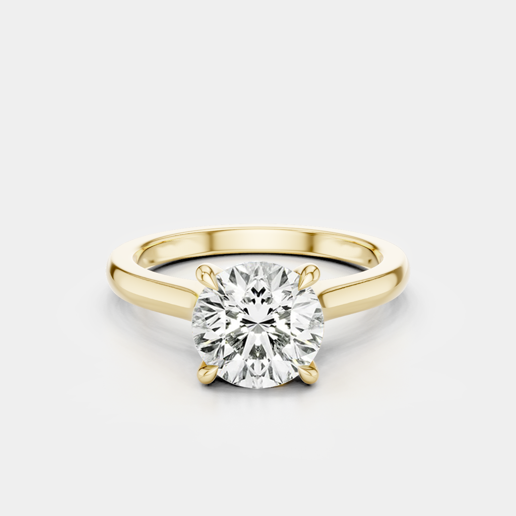 Sloane round brilliant four claw solitaire swept shoulder engagement ring in 18ct yellow gold