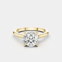 Sloane round brilliant four claw solitaire swept shoulder engagement ring in 18ct yellow gold