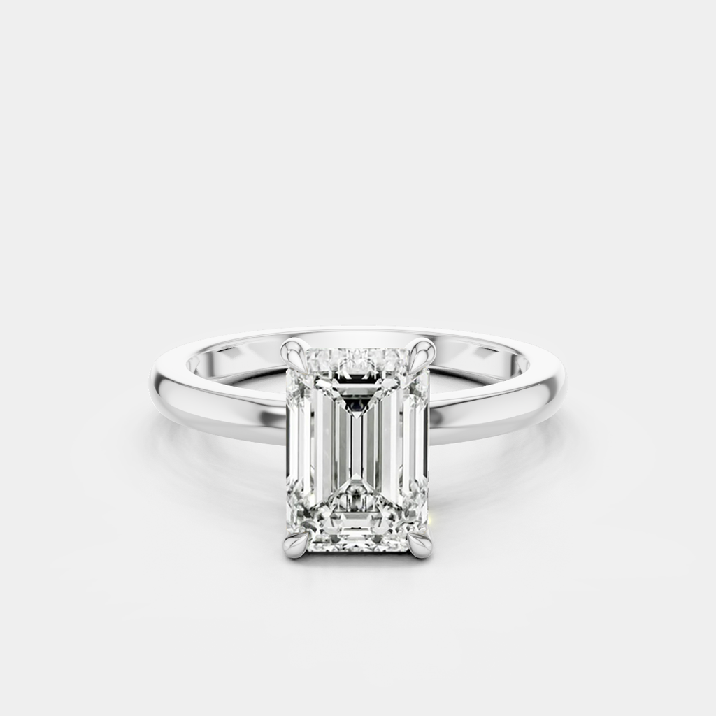 Lexington emerald cut solitaire classic engagement ring in 18ct white gold