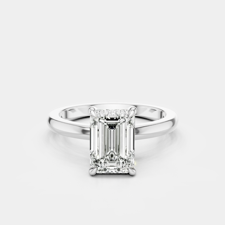Lexington emerald cut solitaire classic engagement ring in 18ct white gold
