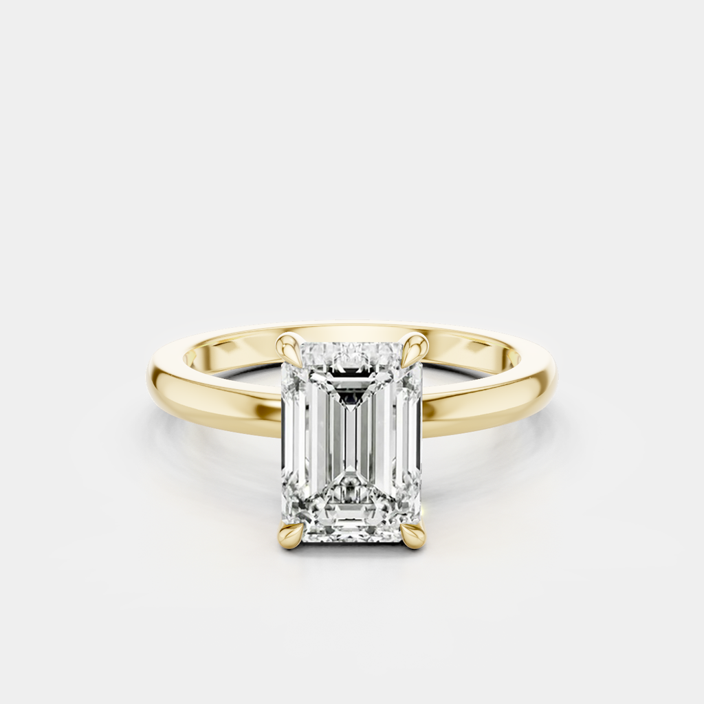 Lexington emerald cut solitaire classic engagement ring in 18ct yellow gold