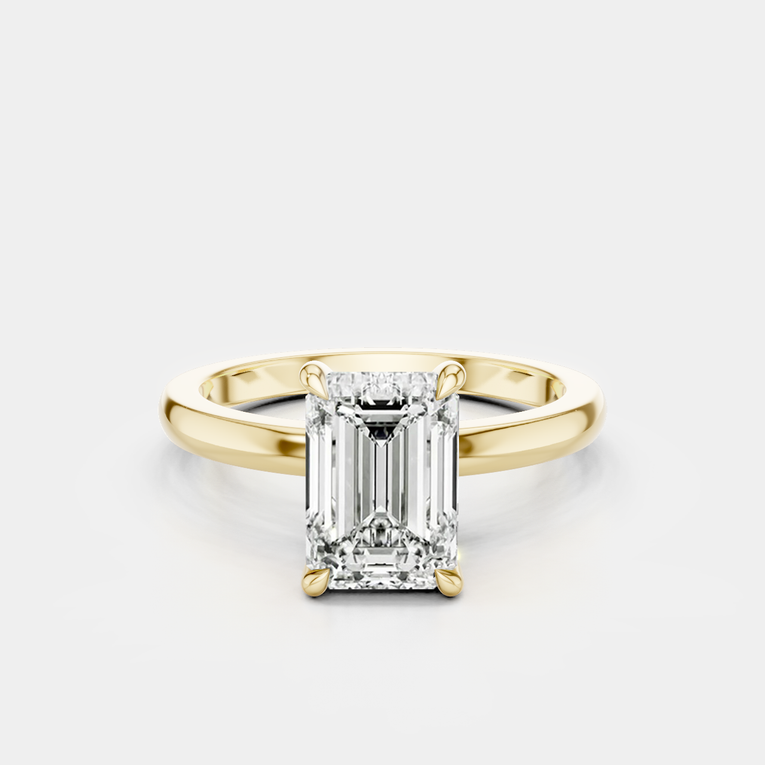 Lexington emerald cut solitaire classic engagement ring in 18ct yellow gold