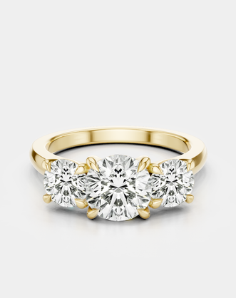Kent round brilliant trilogy engagement ring in 18ct yellow gold 