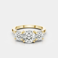 Kent round brilliant trilogy engagement ring in 18ct yellow gold 