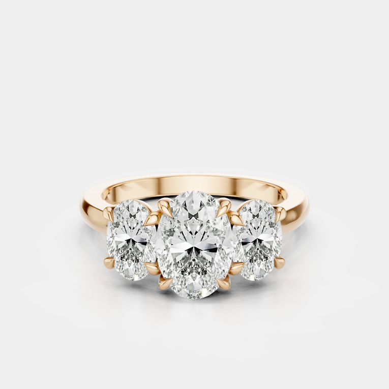 Clarkson oval trilogy engagement ring in 18ct rose gold