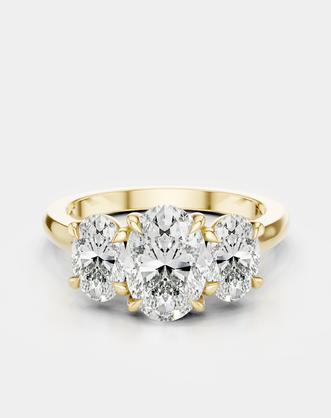 Clarkson oval trilogy engagement ring in 18ct yellow gold