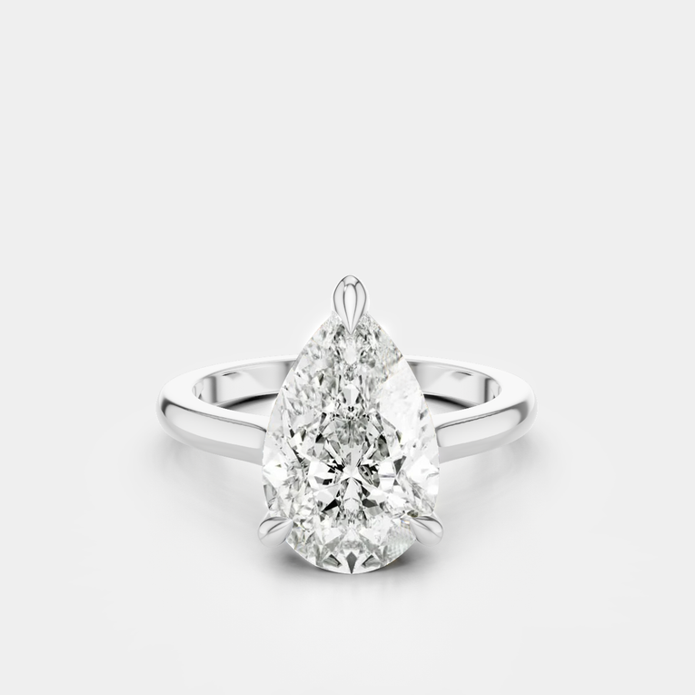 Dauphine pear cut solitaire classic engagement ring in 18ct white gold