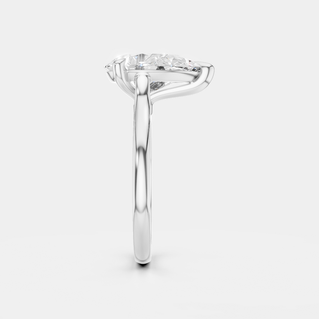 Dauphine pear cut solitaire classic engagement ring in 18ct white gold, side view