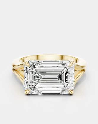 Perry East-West 5ct emerald solitaire double band engagement ring in 18ct yellow gold