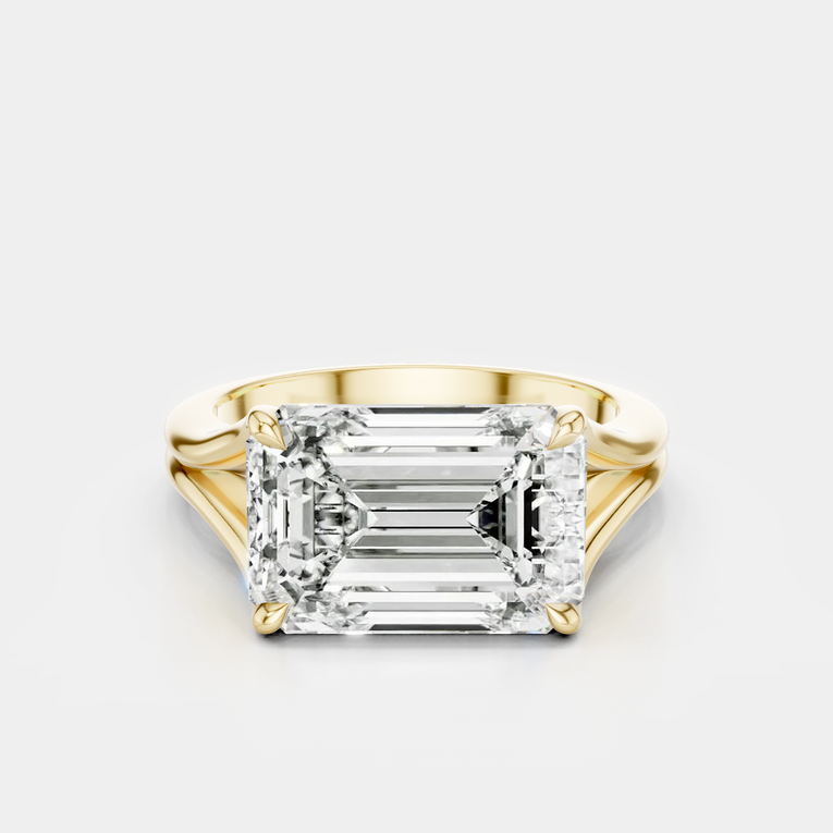Perry East-West 5ct emerald solitaire double band engagement ring in 18ct yellow gold
