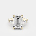 Elizabeth 5ct emerald cut tapered baguette engagement ring in 18ct yellow gold