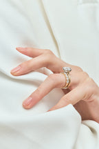 Model wears Model wears Oxford round brilliant six claw solitaire classic engagement ring in 18ct yellow gold