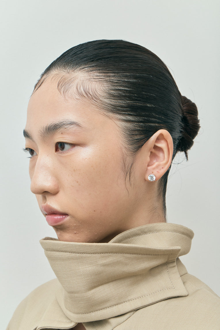 Model wears Rowan 2ct round brilliant cut diamond studs in 18ct white gold