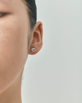 Model wears Dean 1ct round brilliant cut diamond studs in 18ct white gold