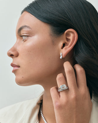 Model wearing Vista 0.10ct Emerald Cut North-South Half Set Wedding Band 