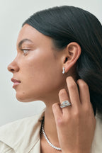 Model wearing Vista 0.10ct Emerald Cut North-South Half Set Wedding Band 