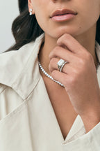 Model wears James 0.10ct Emerald Cut East-West Half Set Wedding Band 18ct white gold