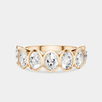 Tournon 0.20ct oval bezel set half eternity band in 18ct rose gold