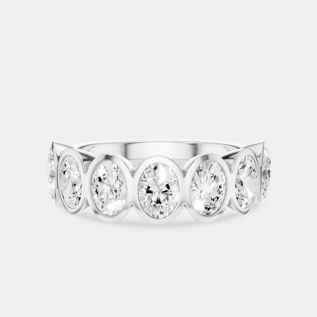 Tournon 0.20ct oval bezel set half eternity band in 18ct white gold