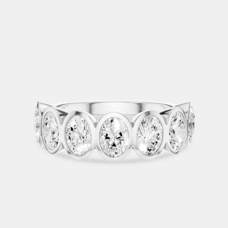 Tournon 0.20ct oval bezel set half eternity band in 18ct white gold