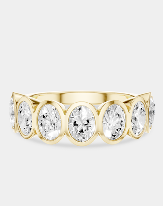 Tournon 0.20ct oval bezel set half eternity band in 18ct yellow gold