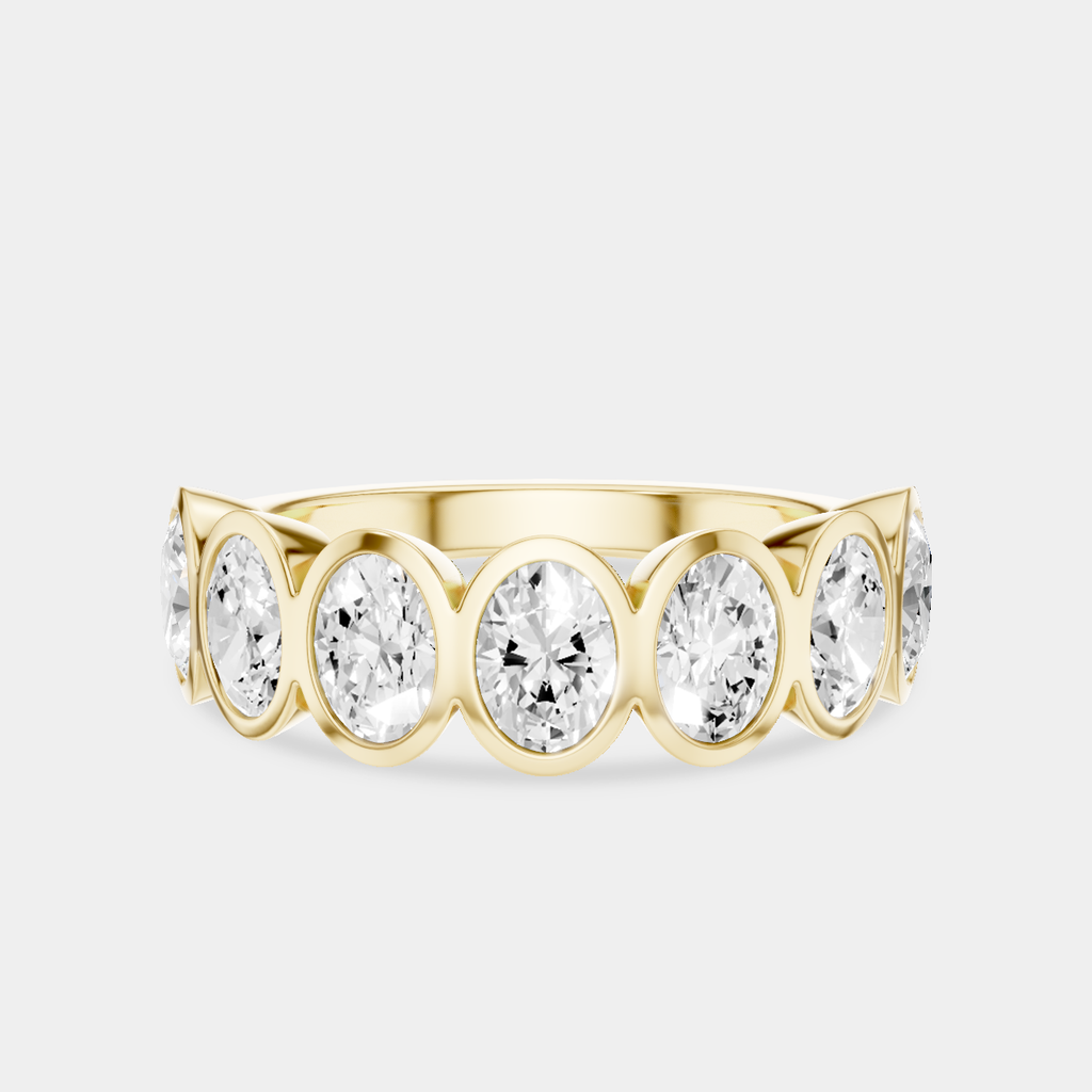 Tournon 0.20ct oval bezel set half eternity band in 18ct yellow gold