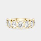 Tournon 0.20ct oval bezel set half eternity band in 18ct yellow gold