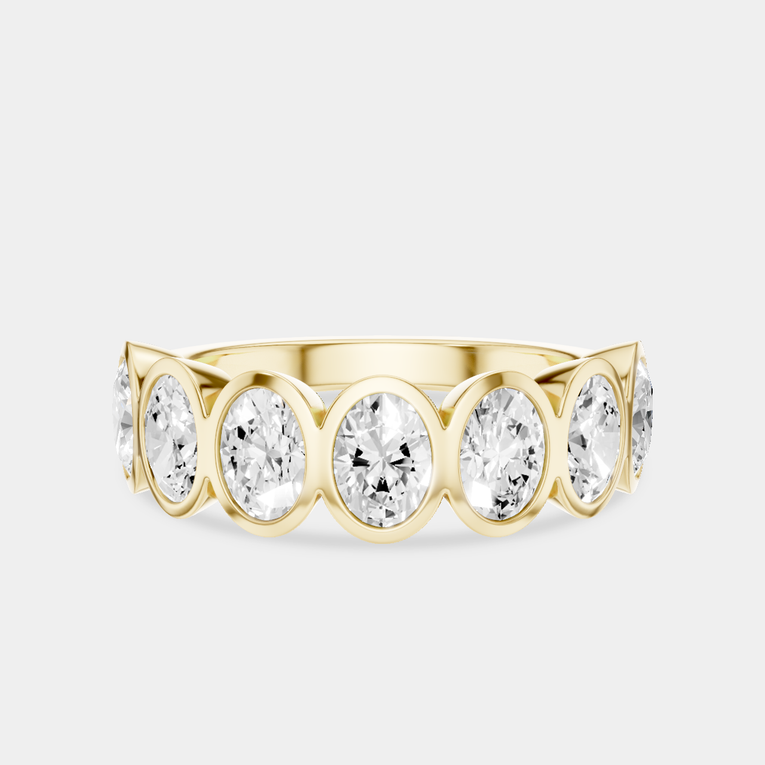 Tournon 0.20ct oval bezel set half eternity band in 18ct yellow gold