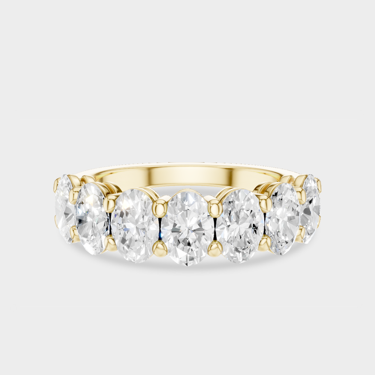Cler 0.30ct oval half eternity band in 18ct yellow gold