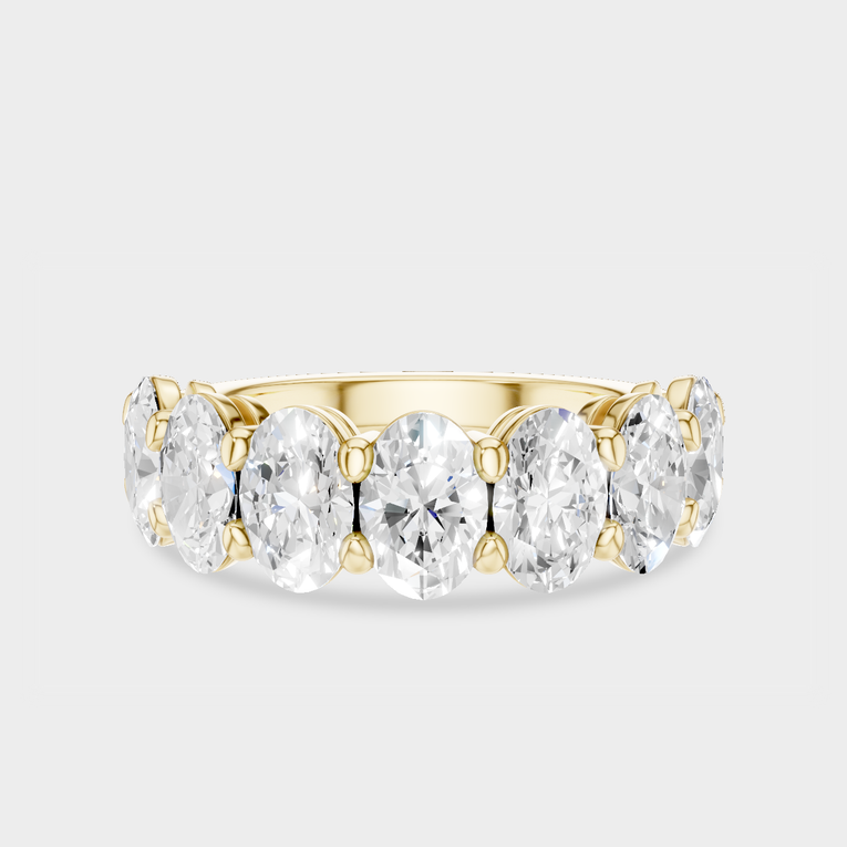 Cler 0.50ct oval half eternity band in 18ct yellow gold