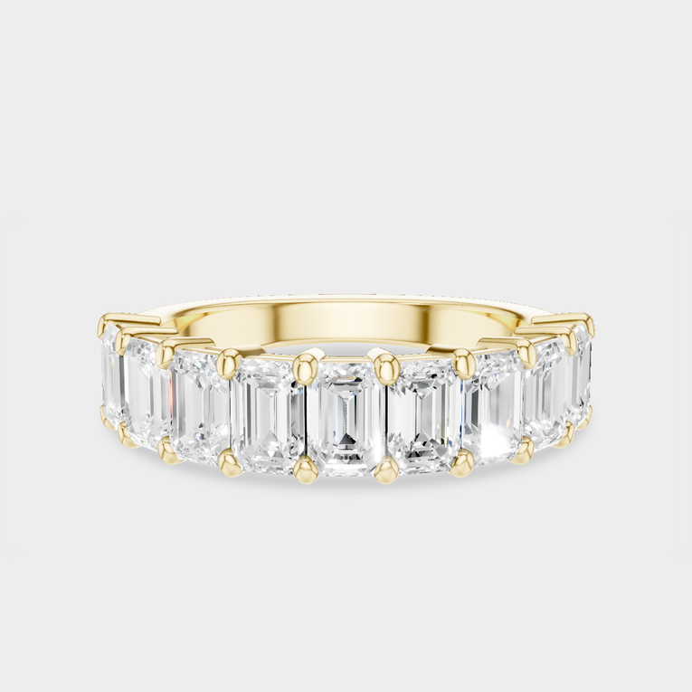 Soho 0.30ct emerald cut half eternity band in 18ct yellow gold