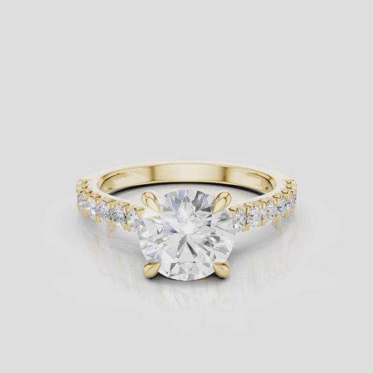 Dean round brilliant four claw diamond band engagement ring in 18ct yellow gold 
