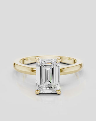 Lexington emerald cut solitaire classic engagement ring in 18ct yellow gold