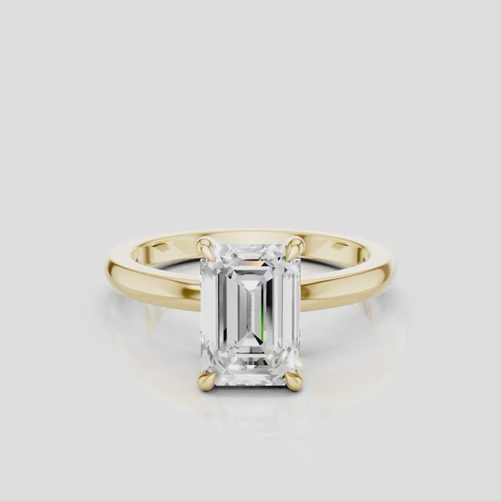Lexington emerald cut solitaire classic engagement ring in 18ct yellow gold