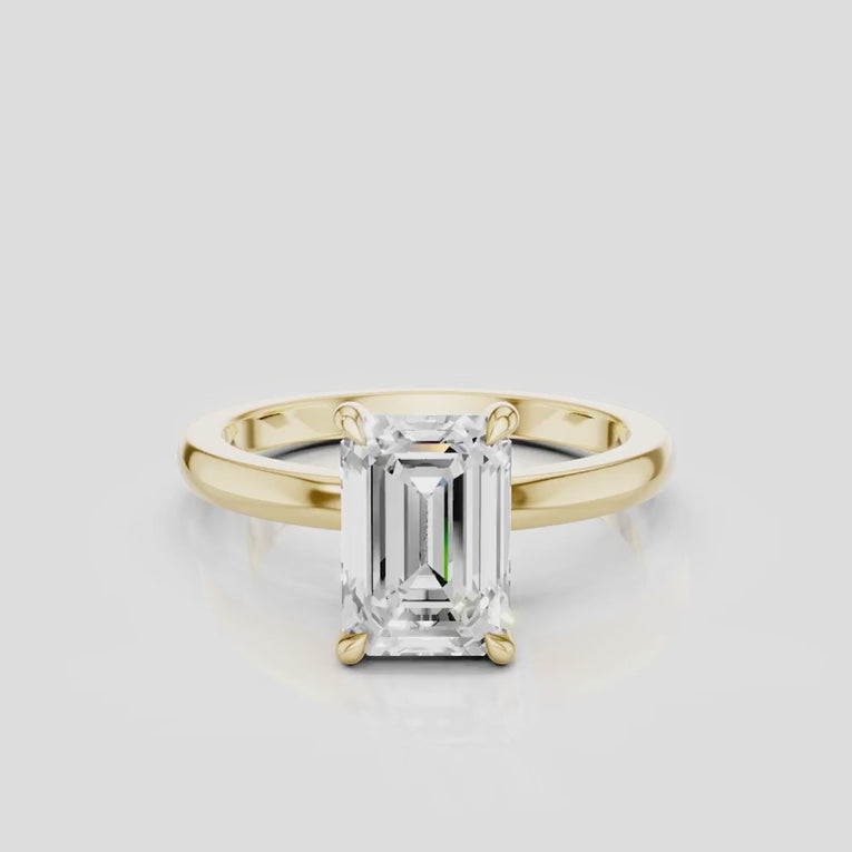 Lexington emerald cut solitaire classic engagement ring in 18ct yellow gold