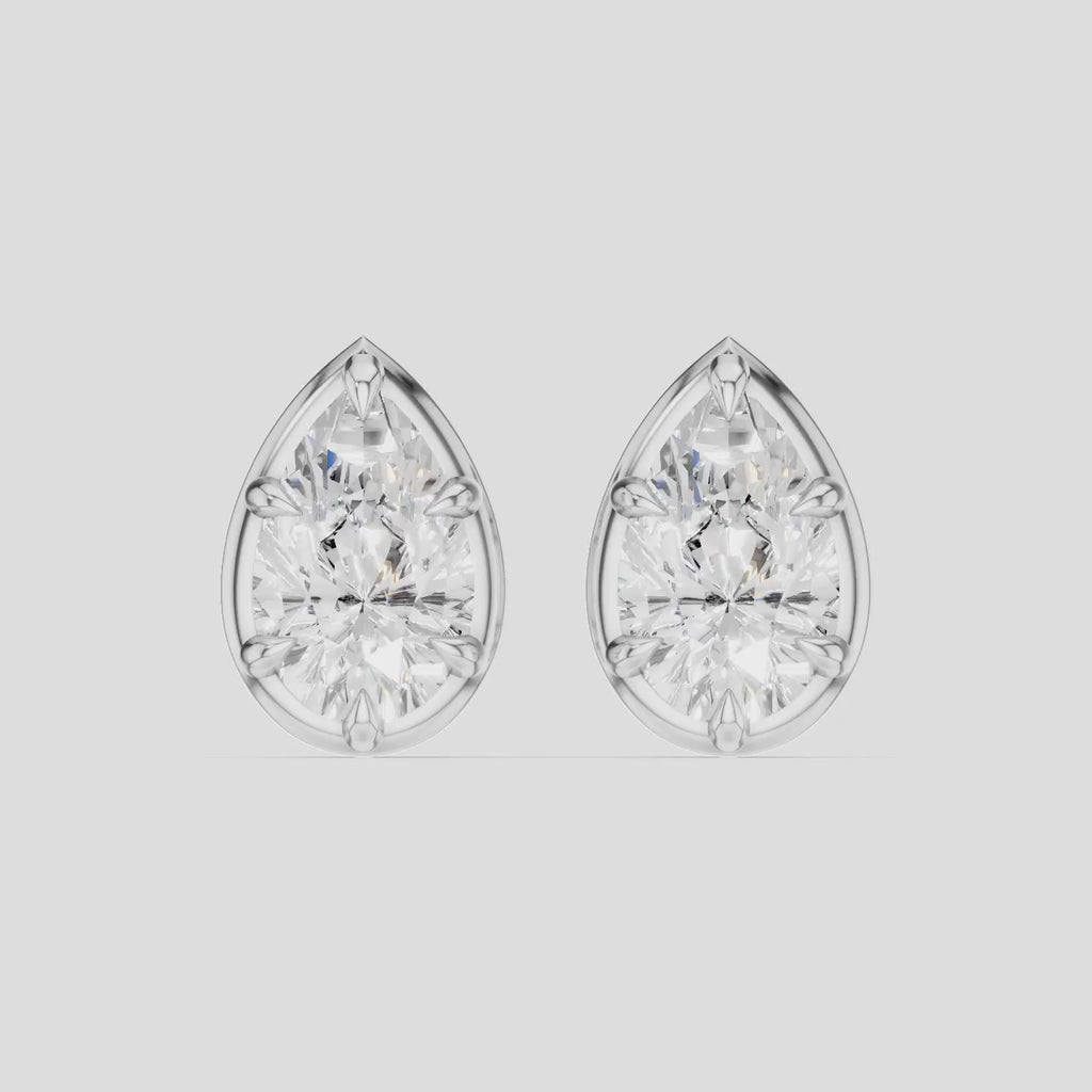 Moncur 1.5ct pear cut diamond studs in 18ct white gold