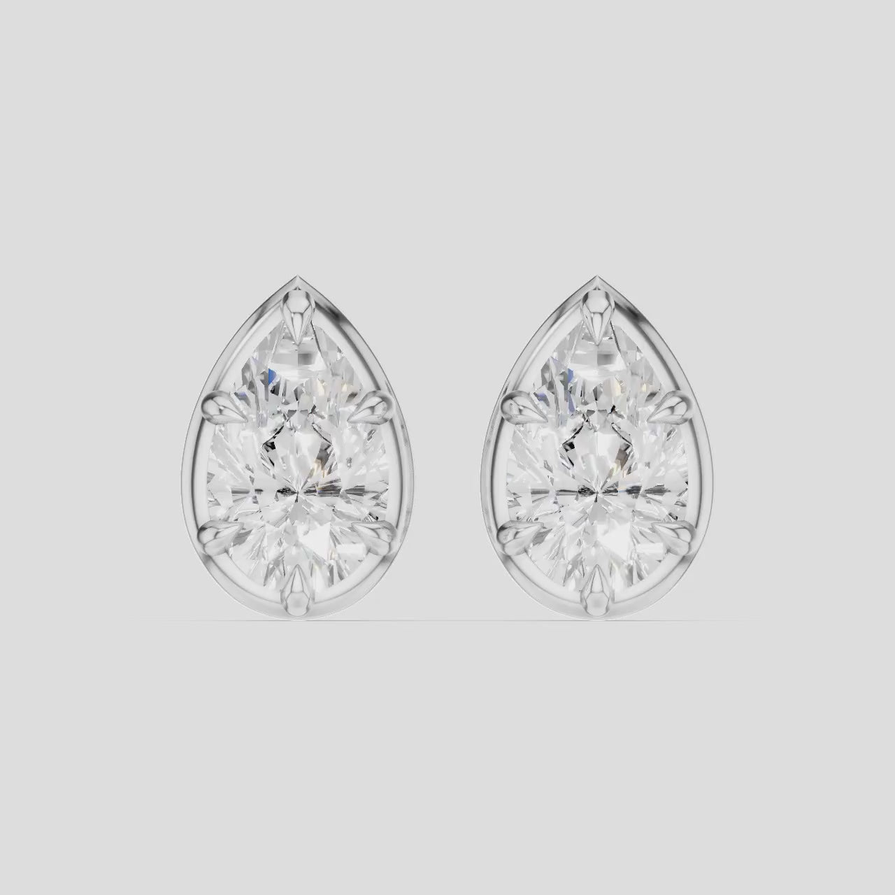Moncur 1.5ct pear cut diamond studs in 18ct white gold