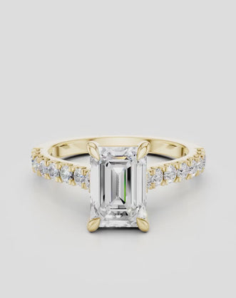 Beverly emerald cut diamond band engagement ring in 18ct yellow gold 