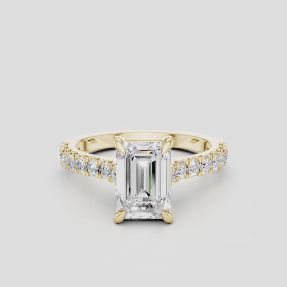 Beverly emerald cut diamond band engagement ring in 18ct yellow gold 