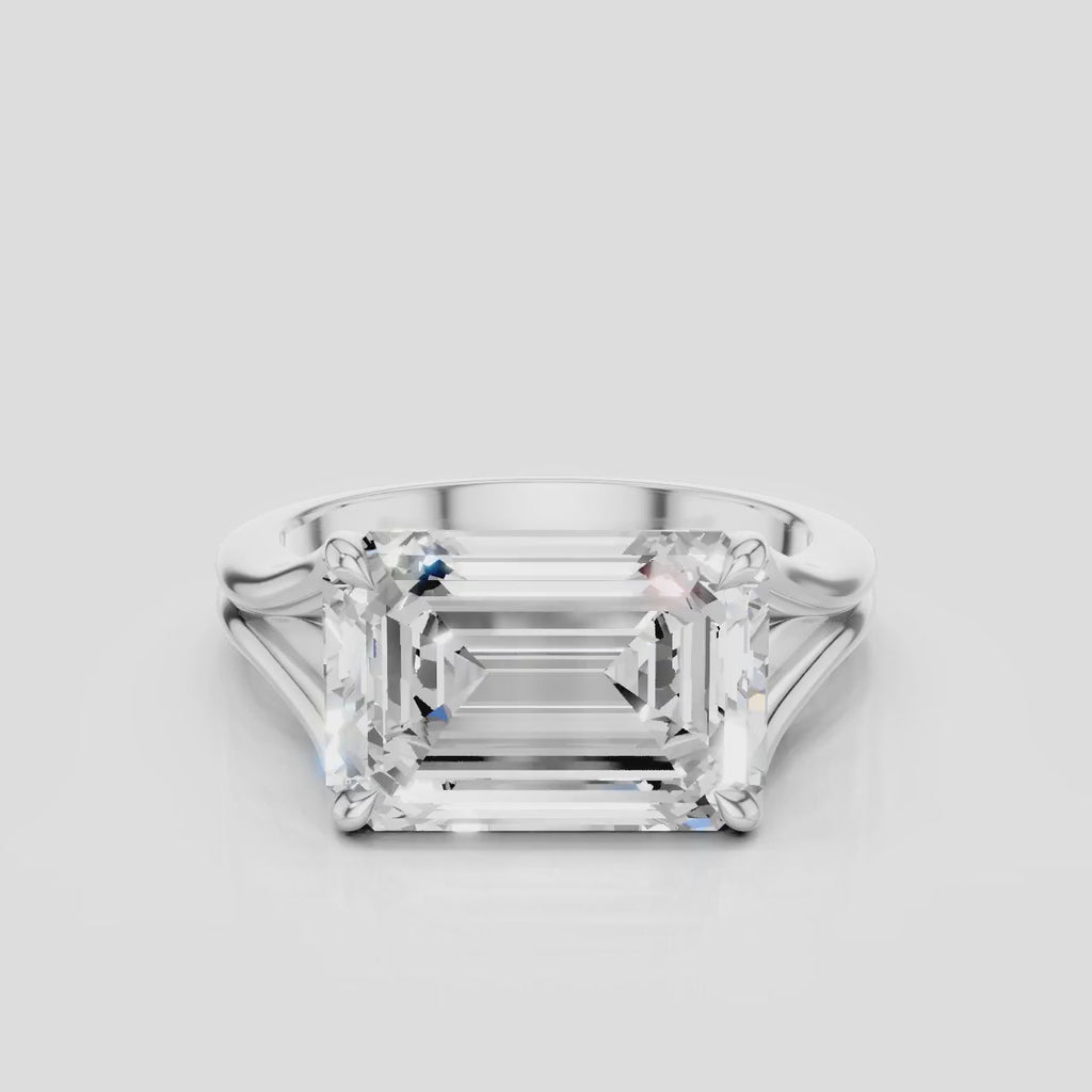 Perry East-West 5ct emerald solitaire double band engagement ring in platinum