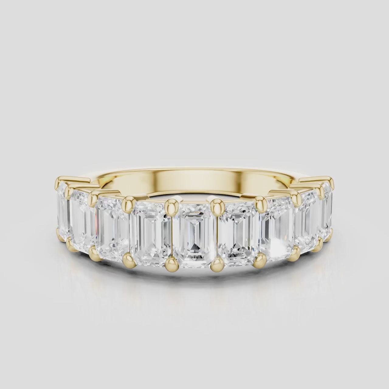 Soho 0.30ct emerald cut half eternity band in 18ct yellow gold