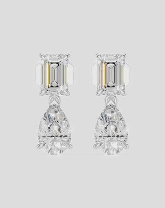 Madame 0.50ct emerald pear cut drop earrings in 18ct white gold