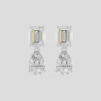 Madame 0.50ct emerald pear cut drop earrings in 18ct white gold