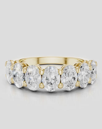 Cler 0.30ct oval half eternity band in 18ct yellow gold
