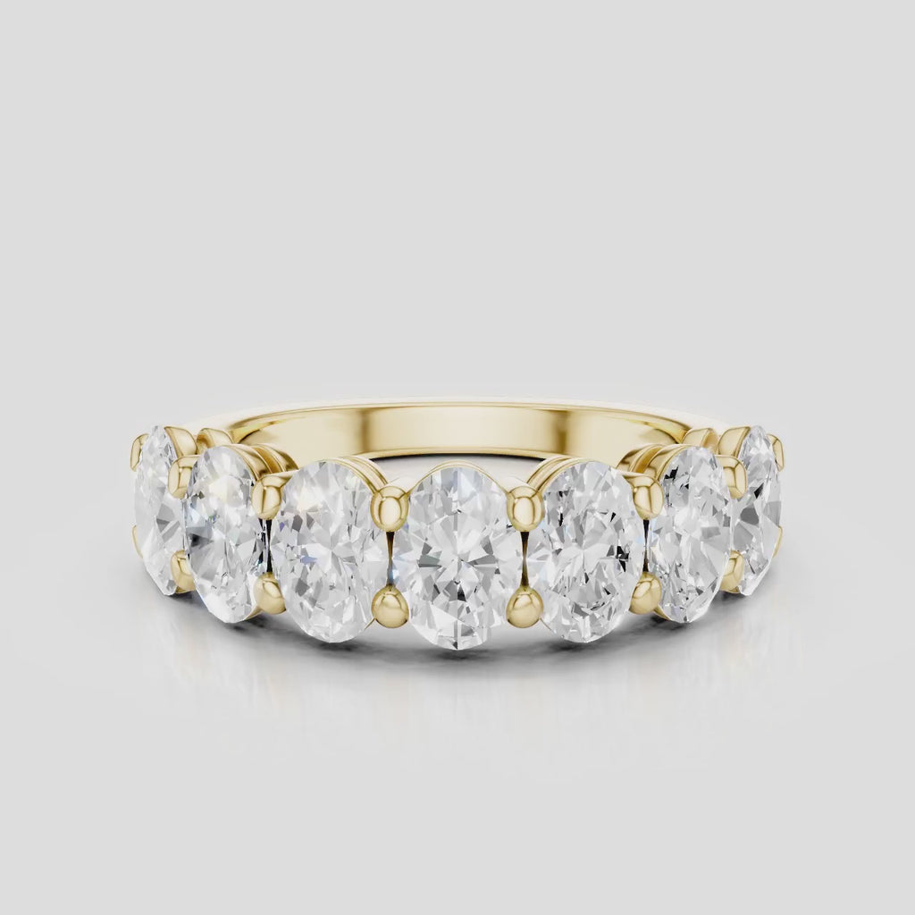 Cler 0.30ct oval half eternity band in 18ct yellow gold