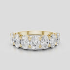 Cler 0.30ct oval half eternity band in 18ct yellow gold