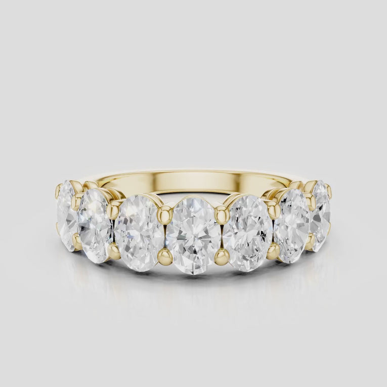 Cler 0.30ct oval half eternity band in 18ct yellow gold