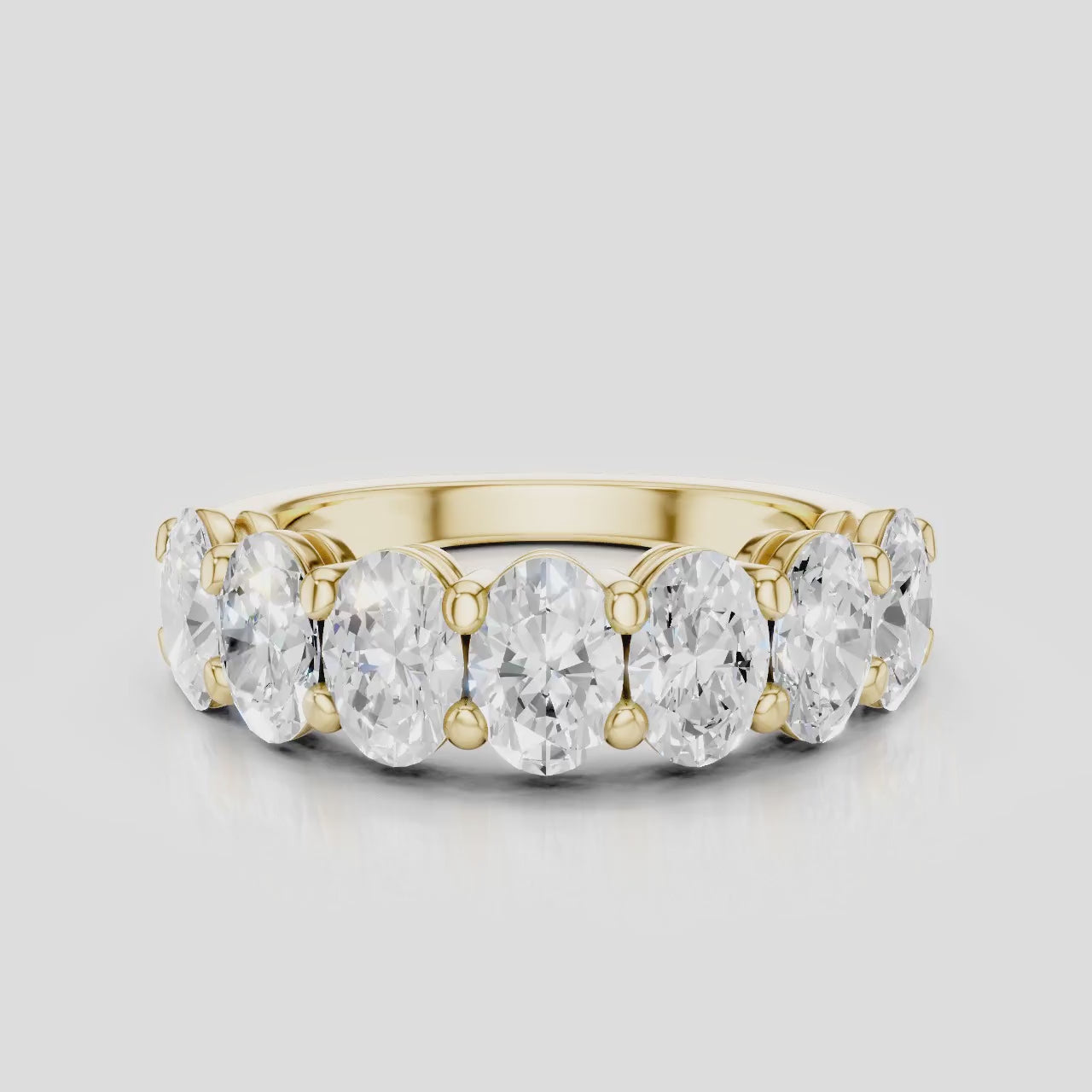 Cler 0.30ct oval half eternity band in 18ct yellow gold