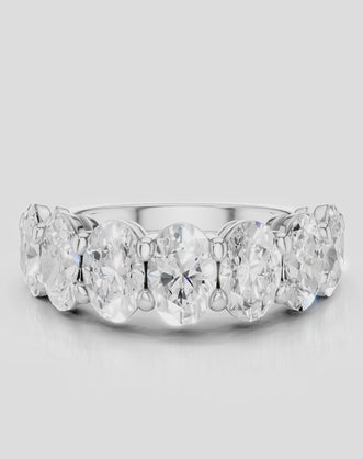 Cler 0.50ct oval half eternity band in 18ct white gold