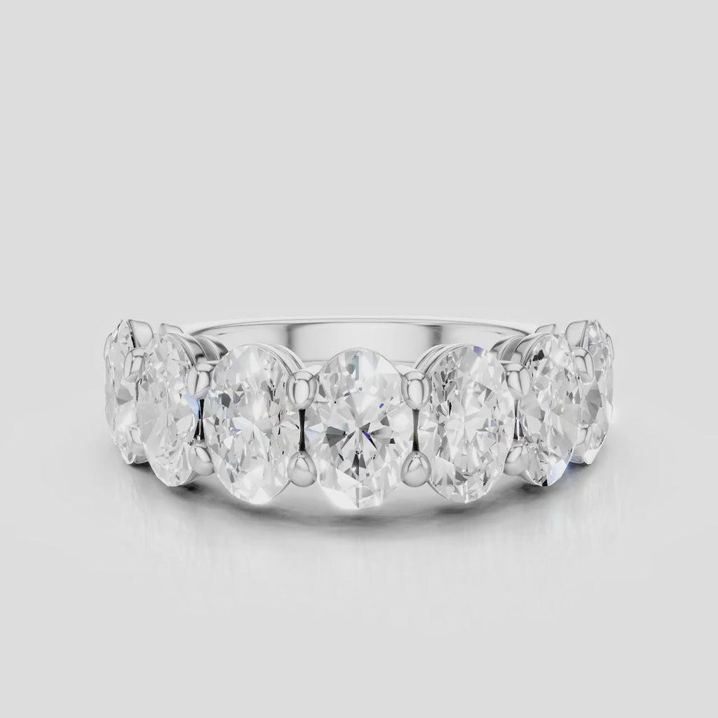 Cler 0.50ct oval half eternity band in 18ct white gold